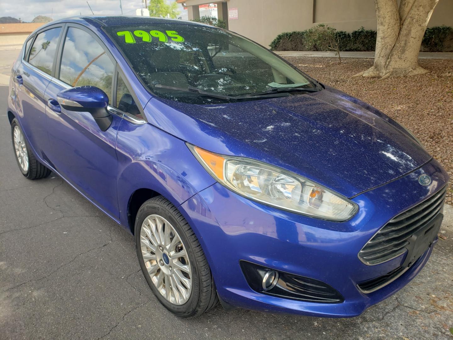 2014 /Tan and black Ford Fiesta Titanium (3FADP4FJ5EM) with an 1.6l i4 engine, 6-Speed Automatic transmission, located at 323 E Dunlap Ave., Phoenix, AZ, 85020, (602) 331-9000, 33.567677, -112.069000 - 2014 Ford Fiesta Titanium,.......A Must See!!... No accidents, Only 95K MILES.... Ice cold AC. The car is gorgeous inside and out. Power windows, Power door locks, Touch screen Stereo/ CD Player, Phone sync, Bluetooth, Satellite compatible, Backup camera, Beautiful tan and black interior with tan le - Photo#2